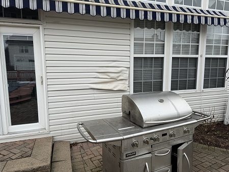 Melted Vinyl Siding Repair Case Study